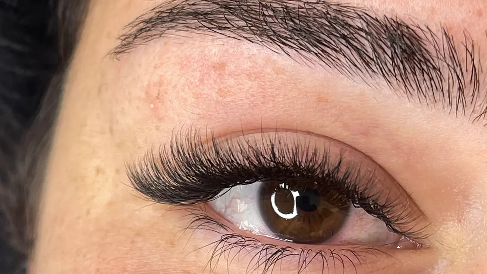 Close-up of a lash extension set by Elina Popova